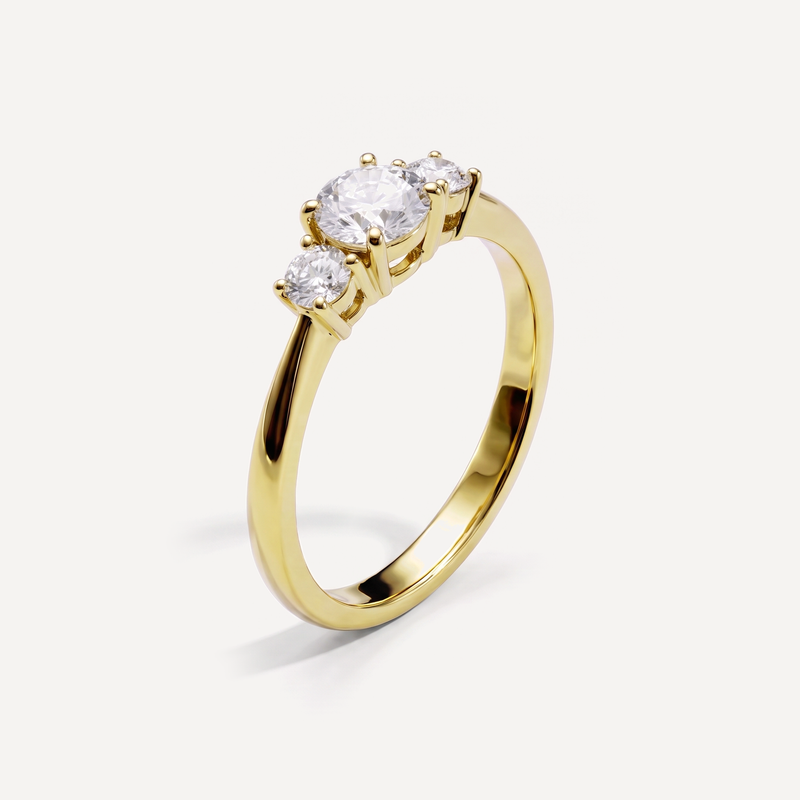 Flora tre-stens ring i guld set fra siden