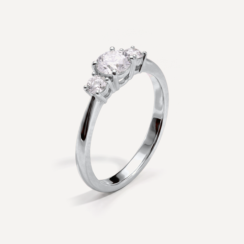 Flora tre-stens ring i hvidguld set fra siden